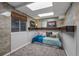 Basement bedroom with a small window and a built in platform bed for comfortable living at 1564 S Uinta Way, Denver, CO 80231
