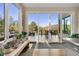 Bright kitchen area with sliding glass doors leading to an outdoor deck and scenic views at 2873 Cortina Ln, Evergreen, CO 80439