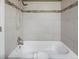 Clean bathroom with shower/tub combo at 9051 Bear Mountain Dr, Highlands Ranch, CO 80126