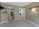 Bright bedroom with access to hallway and bathroom at 9051 Bear Mountain Dr, Highlands Ranch, CO 80126