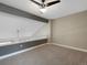 Bedroom with vaulted ceiling and ceiling fan at 9051 Bear Mountain Dr, Highlands Ranch, CO 80126