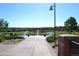 Community water fountain with a paved walkway at 9051 Bear Mountain Dr, Highlands Ranch, CO 80126