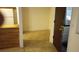 Galley kitchen adjacent to an area with tile flooring at 14806 E 2Nd Ave Ave # 105G, Aurora, CO 80011