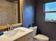 Stylish bathroom featuring a modern vanity, updated tiling, and sleek fixtures at 26212 Center Dr, Kittredge, CO 80457