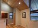 Inviting entryway featuring wood accents, hardwood floors, and plenty of natural light at 26212 Center Dr, Kittredge, CO 80457