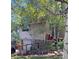 Charming home with a stone facade, fenced yard, and mature birch trees for added curb appeal at 26212 Center Dr, Kittredge, CO 80457