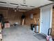 Spacious two car garage with storage space and additional shelving at 26212 Center Dr, Kittredge, CO 80457