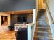 View of living room with plush furniture, hardwood floors, and modern wall art at 26212 Center Dr, Kittredge, CO 80457