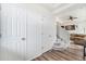 Bright entryway with hardwood floors and staircase leading to the main living area at 3934 N Quatar Ct, Aurora, CO 80019