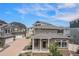 Beautiful two story home with stone accents and a covered porch entry at 3934 N Quatar Ct, Aurora, CO 80019