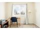 Functional office space with a desk, chair, and neutral tones perfect for productivity at 466 S Kingston Cir, Aurora, CO 80012