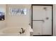 Bright bathroom features a soaking tub and glass enclosed shower at 3549 Mallard Dr, Highlands Ranch, CO 80126