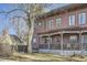 Charming multi-story home with a covered front porch and mature trees at 820 Kimbark St # B, Longmont, CO 80501