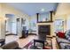 Cozy living room with a fireplace and neutral decor at 820 Kimbark St # B, Longmont, CO 80501
