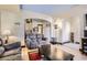 Bright living room featuring hardwood floors and a large window at 820 Kimbark St # B, Longmont, CO 80501