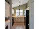 Efficient kitchen with appliances and storage, also includes a washer and dryer at 9640 W Chatfield Ave # A, Littleton, CO 80128
