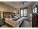 King-size bed, large dresser, and window with mountain views at 600 Columbine Rd # 5207, Breckenridge, CO 80424