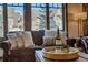 Cozy living room with a window seat and mountain views at 600 Columbine Rd # 5207, Breckenridge, CO 80424