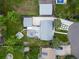 Expansive property with a spacious backyard, fire pit, detached garage, and well-maintained landscaping at 1260 Hoyt St, Lakewood, CO 80215