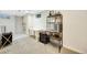 Basement room featuring dining table and sleek bar with wine cooler at 1260 Hoyt St, Lakewood, CO 80215