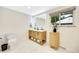 Modern bathroom with a large vanity, illuminated mirror and stylish design at 1260 Hoyt St, Lakewood, CO 80215