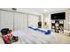 Comfortable bedroom with white bedding and closet at 1260 Hoyt St, Lakewood, CO 80215