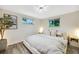 Calming bedroom with natural light, stylish decor, and a comfortable modern platform bed at 1260 Hoyt St, Lakewood, CO 80215