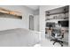 Inviting bedroom with a dedicated office space and closet at 19210 E Pacific Pl, Aurora, CO 80013