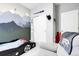 Charming bedroom features mountain mural, car bed, and fun decorative accents at 19210 E Pacific Pl, Aurora, CO 80013