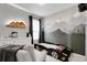 bedroom features mountain mural, a car bed, and a decorative mountain shelf at 19210 E Pacific Pl, Aurora, CO 80013