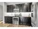 Close up of updated kitchen with stainless steel appliances and modern cabinets at 19210 E Pacific Pl, Aurora, CO 80013