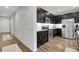 Well-lit kitchen with modern appliances, granite countertops, and ample cabinet space at 19210 E Pacific Pl, Aurora, CO 80013
