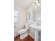 Clean half bathroom with modern fixtures and stylish design at 2362 Xanthia Way, Denver, CO 80238