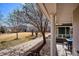 Charming outdoor view from a covered porch, creating a welcoming space for relaxation and entertainment at 2362 Xanthia Way, Denver, CO 80238