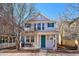 Charming two-story home with a front porch and colorful accents at 2362 Xanthia Way, Denver, CO 80238