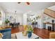 Open concept living area combining a modern kitchen, dining area, and comfortable seating at 2362 Xanthia Way, Denver, CO 80238