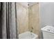 Clean bathroom featuring a tiled shower, bathtub, showerhead, and sink at 915 26Th St, Denver, CO 80205