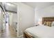 Comfortable bedroom featuring a wood bed frame and stylish accent pillows at 915 26Th St, Denver, CO 80205