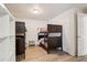 This bedroom features dark bunkbeds and light laminate flooring at 915 26Th St, Denver, CO 80205
