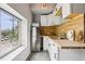 Efficient kitchen space featuring modern appliances, butcher block countertops, and ample natural light at 915 26Th St, Denver, CO 80205