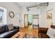 Inviting living room with hardwood floors, comfortable seating, and natural light at 915 26Th St, Denver, CO 80205