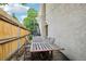 Inviting patio area featuring a wooden dining table, chairs, and string lights for outdoor dining at 915 26Th St, Denver, CO 80205