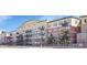 Multi-story apartment building with balconies at 13456 Via Varra # 315, Broomfield, CO 80020