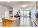 Beautiful living room with fireplace and an open floor plan that connects seamlessly to the kitchen at 13456 Via Varra # 315, Broomfield, CO 80020