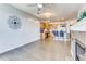 Stylish living room and kitchen featuring hardwood floors, modern fixtures, and a welcoming ambiance at 13456 Via Varra # 315, Broomfield, CO 80020