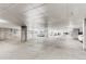 Spacious parking garage with visible parking spots at 13456 Via Varra # 315, Broomfield, CO 80020