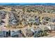 An aerial view showcasing the neighborhood's layout with its nicely planned streets and various home styles at 8385 Briar Trace Dr, Castle Pines, CO 80108