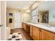 Primary bathroom features an expansive vanity with double sinks, a soaking tub and a shower at 8385 Briar Trace Dr, Castle Pines, CO 80108