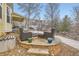 Outdoor fire pit area with comfortable seating, perfect for relaxing evenings outdoors at 8385 Briar Trace Dr, Castle Pines, CO 80108