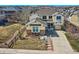Charming two-story home with a well-manicured lawn and inviting curb appeal at 8385 Briar Trace Dr, Castle Pines, CO 80108